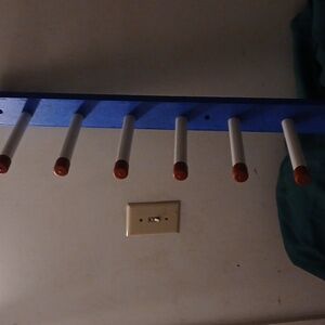 35-inch rack.Can be used for coats or clothes. I can be mounted to the wall